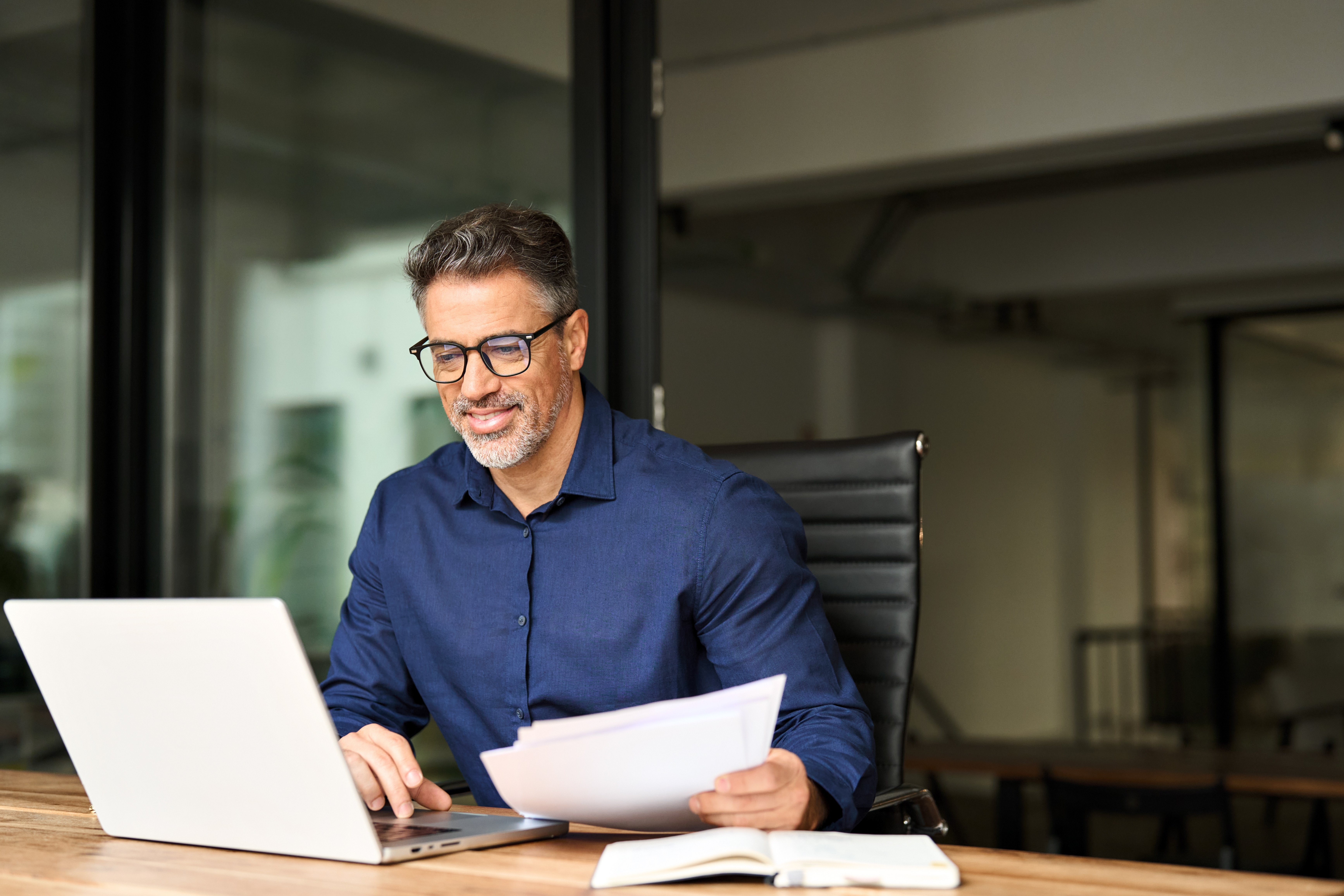 Clean bookkeeping workspace representing personal, reliable financial management for small businesses